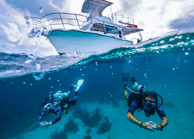 Boat and divers